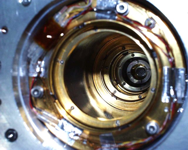 A metallic cylinder with stepped sides. (67K JPEG)