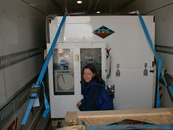 Cold-looking engineer in the truck with XRS (58K JPEG)