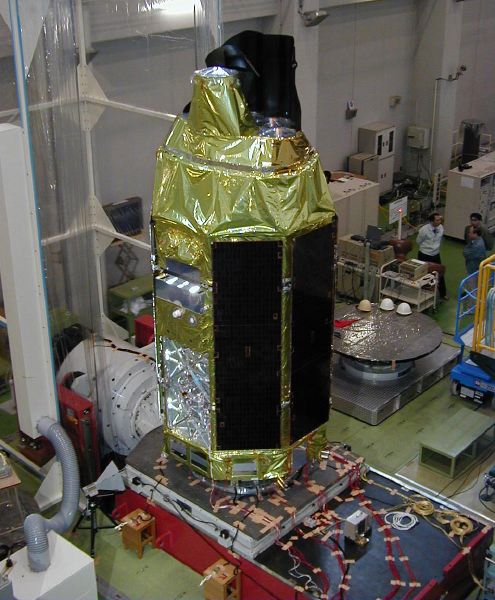 ASTRO-E sitting on the vibration table (66K JPEG)